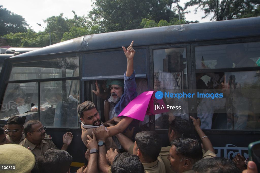 LUCKNOW, INDIA, OCTOBER 2, 2026: Police detain members of the Students' Federation of India and other activists during a protest at Parivartan Chowk in Lucknow against Chief Election Commissioner Gyanesh Kumar. Demonstrators demanded Kumar's resignation and raised concerns over the Election Commission's Special Intensive Revision of electoral rolls. Police stopped protesters as they attempted to march through the city, detaining students and activists. The Election Commission has defended the voter-roll revision process and rejected allegations of wrongdoing. Photo by Amit Shukla / JNA Press. (Photo by Amit shukla/JNA Press via Nexpher Images)