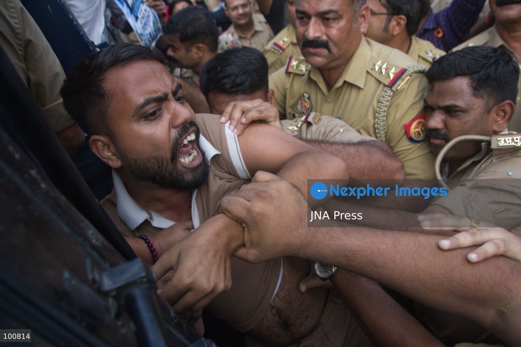 LUCKNOW, INDIA, OCTOBER 2, 2026: Police detain members of the Students' Federation of India and other activists during a protest at Parivartan Chowk in Lucknow against Chief Election Commissioner Gyanesh Kumar. Demonstrators demanded Kumar's resignation and raised concerns over the Election Commission's Special Intensive Revision of electoral rolls. Police stopped protesters as they attempted to march through the city, detaining students and activists. The Election Commission has defended the voter-roll revision process and rejected allegations of wrongdoing. Photo by Amit Shukla / JNA Press. (Photo by Amit shukla/JNA Press via Nexpher Images)