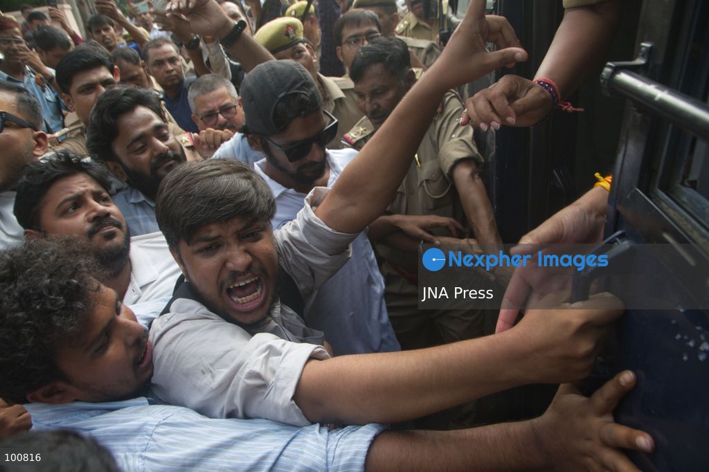 LUCKNOW, INDIA, OCTOBER 2, 2026: Police detain members of the Students' Federation of India and other activists during a protest at Parivartan Chowk in Lucknow against Chief Election Commissioner Gyanesh Kumar. Demonstrators demanded Kumar's resignation and raised concerns over the Election Commission's Special Intensive Revision of electoral rolls. Police stopped protesters as they attempted to march through the city, detaining students and activists. The Election Commission has defended the voter-roll revision process and rejected allegations of wrongdoing. Photo by Amit Shukla / JNA Press. (Photo by Amit shukla/JNA Press via Nexpher Images)