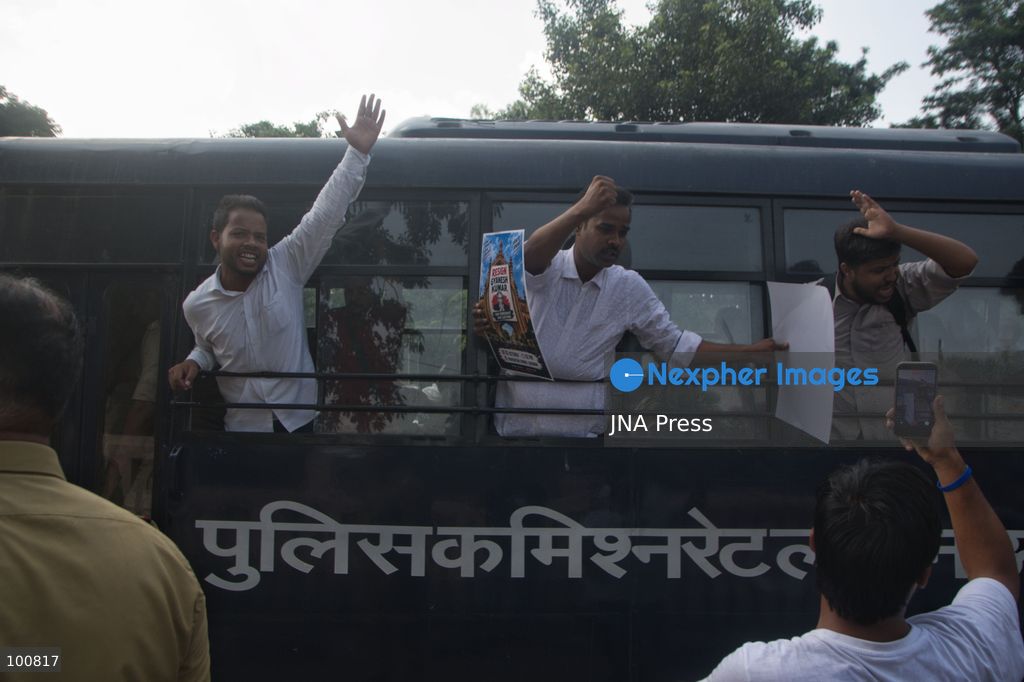 LUCKNOW, INDIA, OCTOBER 2, 2026: Police detain members of the Students' Federation of India and other activists during a protest at Parivartan Chowk in Lucknow against Chief Election Commissioner Gyanesh Kumar. Demonstrators demanded Kumar's resignation and raised concerns over the Election Commission's Special Intensive Revision of electoral rolls. Police stopped protesters as they attempted to march through the city, detaining students and activists. The Election Commission has defended the voter-roll revision process and rejected allegations of wrongdoing. Photo by Amit Shukla / JNA Press. (Photo by Amit shukla/JNA Press via Nexpher Images)
