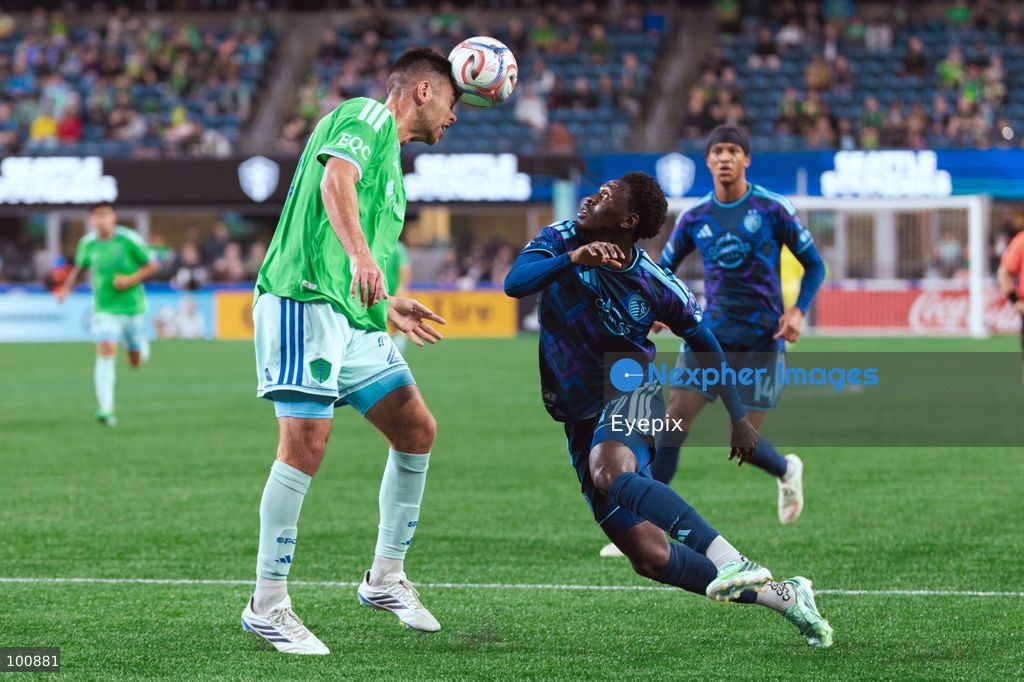 Jackson Ragen #25 of Seattle Sounders FC and Stephen Afrifa #17 of Sporting Kansas City battle for the header during the MLS match between Sounders FC and Sporting Kansas City at Lumen Field. on October 1, 2026 in Seattle, Washington. (Photo by Jules Doyle/ Eyepix Group) (Photo by Jules Doyle/ Eyepix Group/Eyepix via Nexpher Images)
