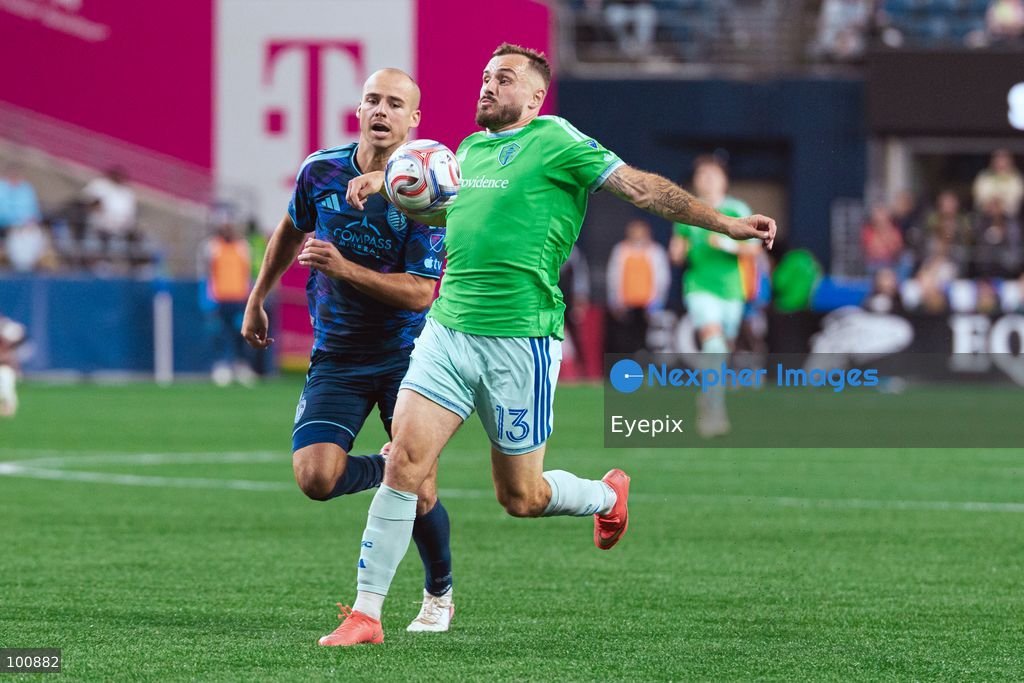 Jordan Morris #13 of Seattle Sounders FC is pressured by Jansen Miller #15 of Sporting Kansas City during the MLS match between Sounders FC and Sporting Kansas City at Lumen Field. on October 1, 2026 in Seattle, Washington. (Photo by Jules Doyle/ Eyepix Group) (Photo by Jules Doyle/ Eyepix Group/Eyepix via Nexpher Images)