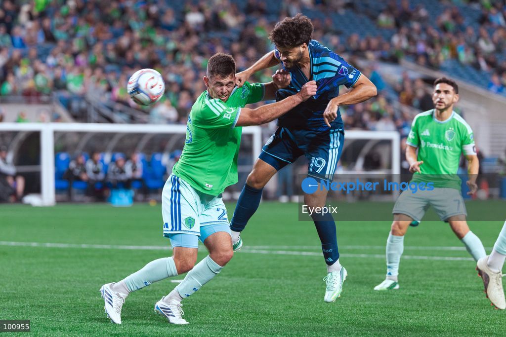 Taylor Calheira #19 of Sporting Kansas City and Jackson Ragen #25 of Seattle Sounders FC battle for the header during the MLS match between Sounders FC and Sporting Kansas City at Lumen Field. on October 1, 2026 in Seattle, Washington. (Photo by Jules Doyle/ Eyepix Group) (Photo by Jules Doyle/ Eyepix Group/Eyepix via Nexpher Images)