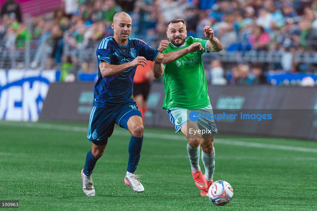 Jordan Morris #13 of Seattle Sounders FC and Jansen Miller #15 of Sporting Kansas City battle for the ball during the MLS match between Sounders FC and Sporting Kansas City at Lumen Field. on October 1, 2026 in Seattle, Washington. (Photo by Jules Doyle/ Eyepix Group) (Photo by Jules Doyle/ Eyepix Group/Eyepix via Nexpher Images)