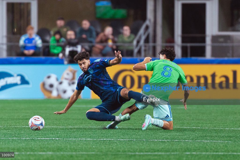 Caden Clark #8 of Seattle Sounders FC fouls Taylor Calheira #19 of Sporting Kansas City during the MLS match between Sounders FC and Sporting Kansas City at Lumen Field. on October 1, 2026 in Seattle, Washington. (Photo by Jules Doyle/ Eyepix Group) (Photo by Jules Doyle/ Eyepix Group/Eyepix via Nexpher Images)