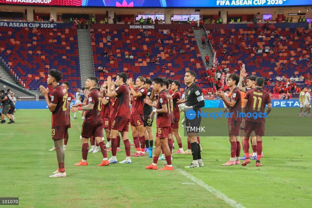 Players of Cambodia applaud and wave to cheering supporters in the stands after battling to a dramatic 2-2 draw against Timor-Leste in their FIFA ASEAN Challenge Cup Group B match at Kai Tak Stadium on September 30, 2026 in Hong Kong. The crucial point secured top spot in Group B and confirmed Cambodia's place in Saturday's final against hosts Hong Kong, China. (Photo by Gordon Choi/TMHK via Nexpher Images)