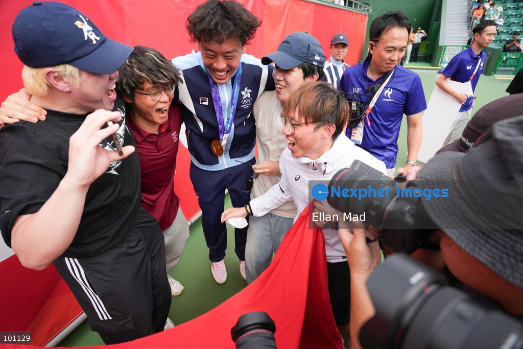 Hong Kong Tennis player, Coleman Wong Chak-lam celebrating with the YouTube channel JFFT members, Coleman wins the Men's Final at the 2026 Asian games on October 3, 2026 in Nagoya, Japan. (Photo by Ellan Mad/Nexpher Images)