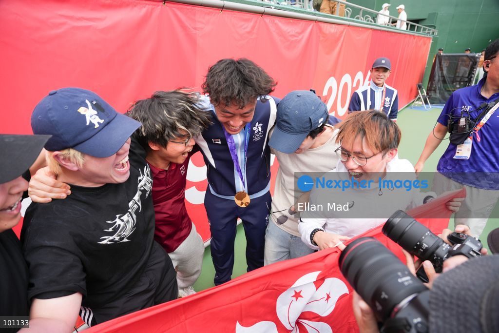 Hong Kong Tennis player, Coleman Wong Chak-lam celebrating with the YouTube channel JFFT members, Coleman wins the Men's Final at the 2026 Asian games on October 3, 2026 in Nagoya, Japan. (Photo by Ellan Mad/Nexpher Images)