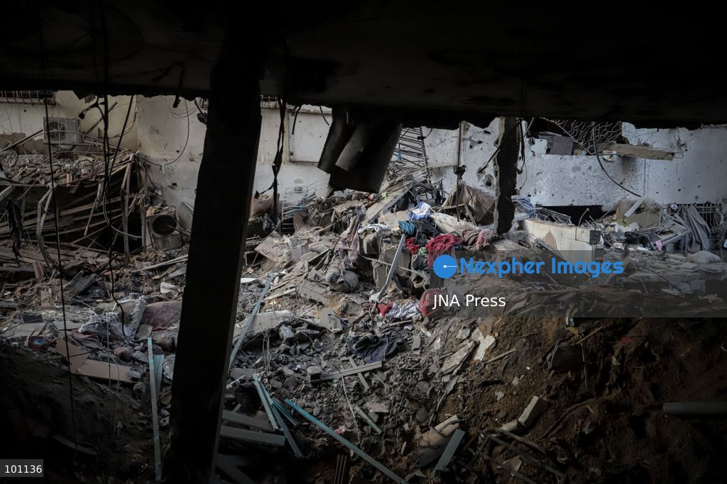 GAZA CITY, GAZA STRIP, OCTOBER 3, 2026: Palestinians and rescue workers search through the rubble following an Israeli airstrike on a residential building in the Rimal neighborhood of western Gaza City early Saturday. At least five Palestinians were killed and others wounded in the strike, according to Gaza health and civil defense officials. Rescue crews continued searching the damaged building for missing people following the attack. There was no immediate comment from the Israeli military. Photo by Mohammed M. Skaik / JNA Press (Photo by Mohammed M Skaik/JNA Press via Nexpher Images)