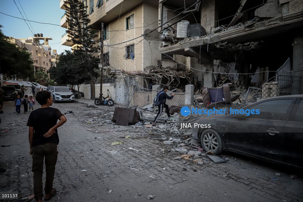 GAZA CITY, GAZA STRIP, OCTOBER 3, 2026: Palestinians and rescue workers search through the rubble following an Israeli airstrike on a residential building in the Rimal neighborhood of western Gaza City early Saturday. At least five Palestinians were killed and others wounded in the strike, according to Gaza health and civil defense officials. Rescue crews continued searching the damaged building for missing people following the attack. There was no immediate comment from the Israeli military. Photo by Mohammed M. Skaik / JNA Press (Photo by Mohammed M Skaik/JNA Press via Nexpher Images)