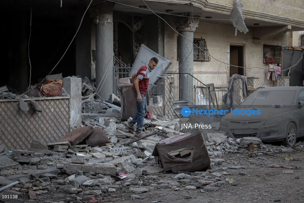 GAZA CITY, GAZA STRIP, OCTOBER 3, 2026: Palestinians and rescue workers search through the rubble following an Israeli airstrike on a residential building in the Rimal neighborhood of western Gaza City early Saturday. At least five Palestinians were killed and others wounded in the strike, according to Gaza health and civil defense officials. Rescue crews continued searching the damaged building for missing people following the attack. There was no immediate comment from the Israeli military. Photo by Mohammed M. Skaik / JNA Press (Photo by Mohammed M Skaik/JNA Press via Nexpher Images)