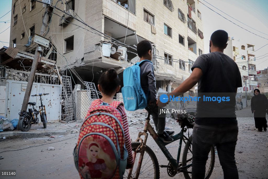 GAZA CITY, GAZA STRIP, OCTOBER 3, 2026: Palestinians and rescue workers search through the rubble following an Israeli airstrike on a residential building in the Rimal neighborhood of western Gaza City early Saturday. At least five Palestinians were killed and others wounded in the strike, according to Gaza health and civil defense officials. Rescue crews continued searching the damaged building for missing people following the attack. There was no immediate comment from the Israeli military. Photo by Mohammed M. Skaik / JNA Press (Photo by Mohammed M Skaik/JNA Press via Nexpher Images)