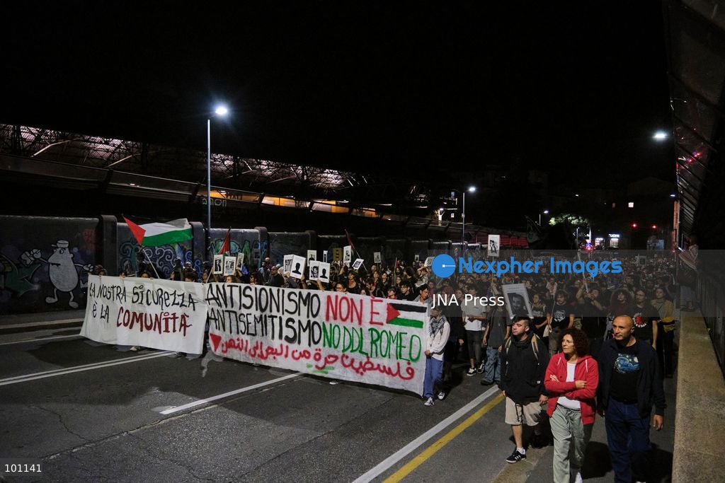 BOLOGNA, ITALY, OCTOBER 2, 2026: Hundreds of demonstrators march through Bologna during a protest against what organizers describe as state and police violence, one year after clashes during a pro-Palestinian demonstration on Viale Masini. Lince, an activist who suffered permanent damage to one eye after being struck by a tear gas canister during the October 2, 2025 demonstration, addressed participants before the march proceeded toward the site where she was injured. The demonstration was organized by the Lince campaign and Giovani Palestinesi. Photo by Lorenzo Paini / JNA Press. (Photo by Lorenzo Pasini/JNA Press via Nexpher Images)