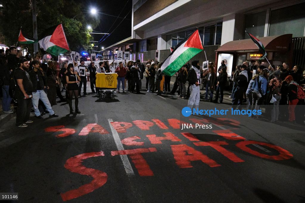 BOLOGNA, ITALY, OCTOBER 2, 2026: Hundreds of demonstrators march through Bologna during a protest against what organizers describe as state and police violence, one year after clashes during a pro-Palestinian demonstration on Viale Masini. Lince, an activist who suffered permanent damage to one eye after being struck by a tear gas canister during the October 2, 2025 demonstration, addressed participants before the march proceeded toward the site where she was injured. The demonstration was organized by the Lince campaign and Giovani Palestinesi. Photo by Lorenzo Paini / JNA Press. (Photo by Lorenzo Pasini/JNA Press via Nexpher Images)