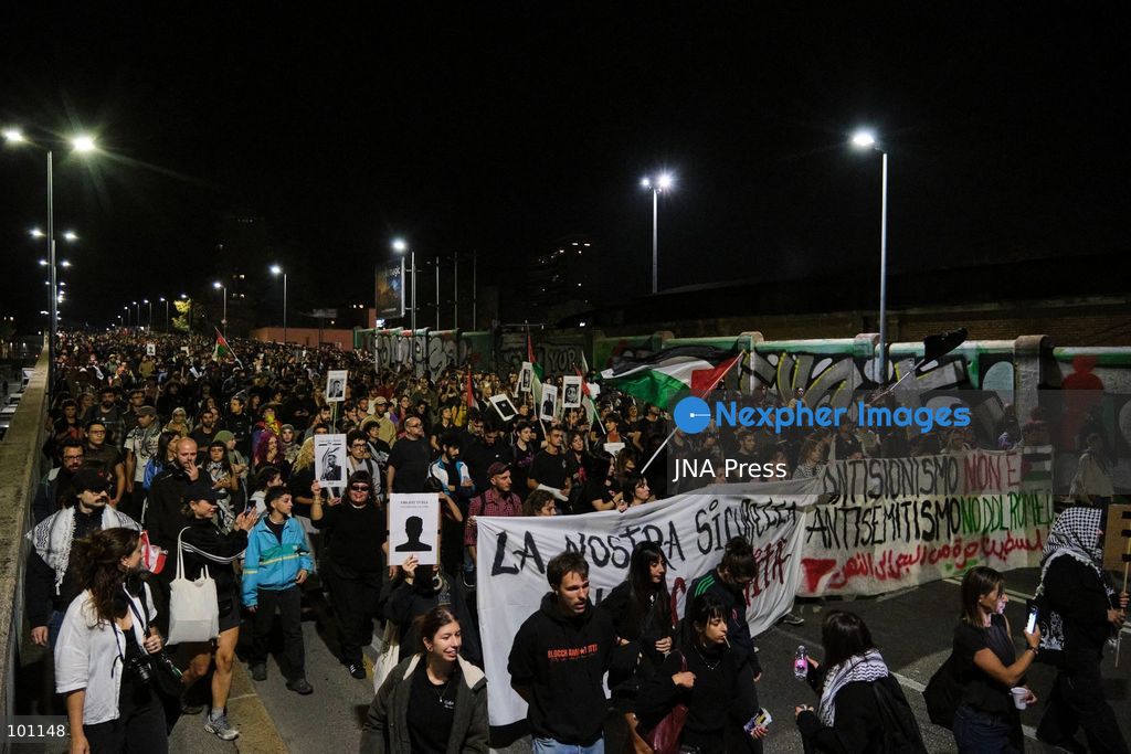 BOLOGNA, ITALY, OCTOBER 2, 2026: Hundreds of demonstrators march through Bologna during a protest against what organizers describe as state and police violence, one year after clashes during a pro-Palestinian demonstration on Viale Masini. Lince, an activist who suffered permanent damage to one eye after being struck by a tear gas canister during the October 2, 2025 demonstration, addressed participants before the march proceeded toward the site where she was injured. The demonstration was organized by the Lince campaign and Giovani Palestinesi. Photo by Lorenzo Paini / JNA Press. (Photo by Lorenzo Pasini/JNA Press via Nexpher Images)