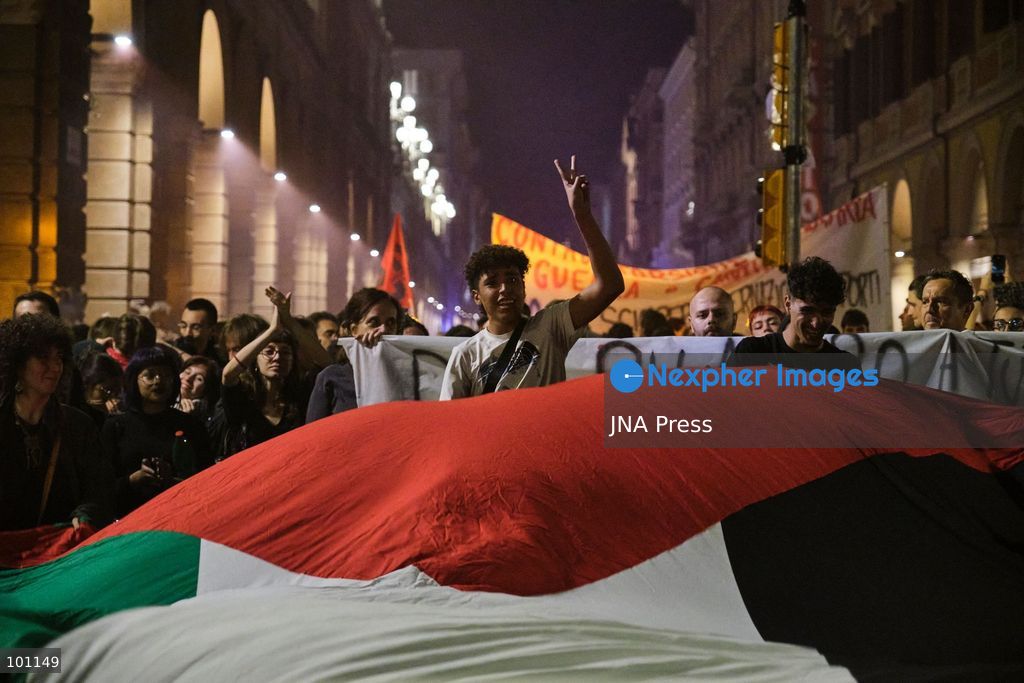 BOLOGNA, ITALY, OCTOBER 2, 2026: Hundreds of demonstrators march through Bologna during a protest against what organizers describe as state and police violence, one year after clashes during a pro-Palestinian demonstration on Viale Masini. Lince, an activist who suffered permanent damage to one eye after being struck by a tear gas canister during the October 2, 2025 demonstration, addressed participants before the march proceeded toward the site where she was injured. The demonstration was organized by the Lince campaign and Giovani Palestinesi. Photo by Lorenzo Paini / JNA Press. (Photo by Lorenzo Pasini/JNA Press via Nexpher Images)
