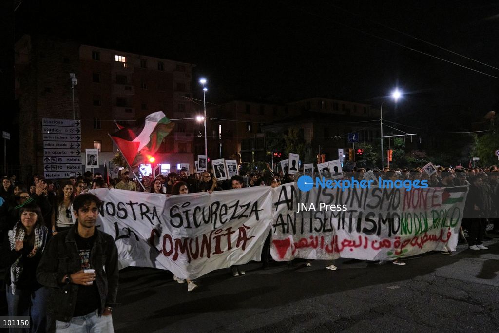 BOLOGNA, ITALY, OCTOBER 2, 2026: Hundreds of demonstrators march through Bologna during a protest against what organizers describe as state and police violence, one year after clashes during a pro-Palestinian demonstration on Viale Masini. Lince, an activist who suffered permanent damage to one eye after being struck by a tear gas canister during the October 2, 2025 demonstration, addressed participants before the march proceeded toward the site where she was injured. The demonstration was organized by the Lince campaign and Giovani Palestinesi. Photo by Lorenzo Paini / JNA Press. (Photo by Lorenzo Pasini/JNA Press via Nexpher Images)