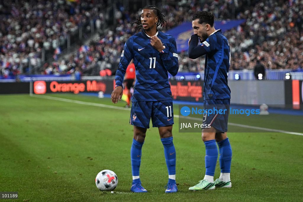 PARIS, FRANCE - OCTOBER 2, 2026: French forward Michael Olise speaks with French forward Rayan Cherki during the Nations League football match between France and Italy at the Stade de France stadium in Saint Denis near Paris on October 2, 2026. Photo by Firas Abdullah / JNA Press (Photo by Firas Abdullah/JNA Press via Nexpher Images)