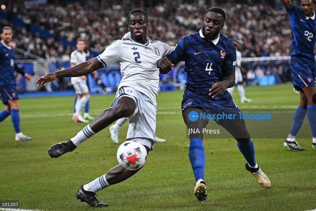 PARIS, FRANCE - OCTOBER 2, 2026: Italy’s defender Michael Kayode fights for the ball against French defender Dayot Upamecano during the Nations League football match between France and Italy at the Stade de France stadium in Saint Denis near Paris on October 2, 2026. Photo by Firas Abdullah / JNA Press (Photo by Firas Abdullah/JNA Press via Nexpher Images)