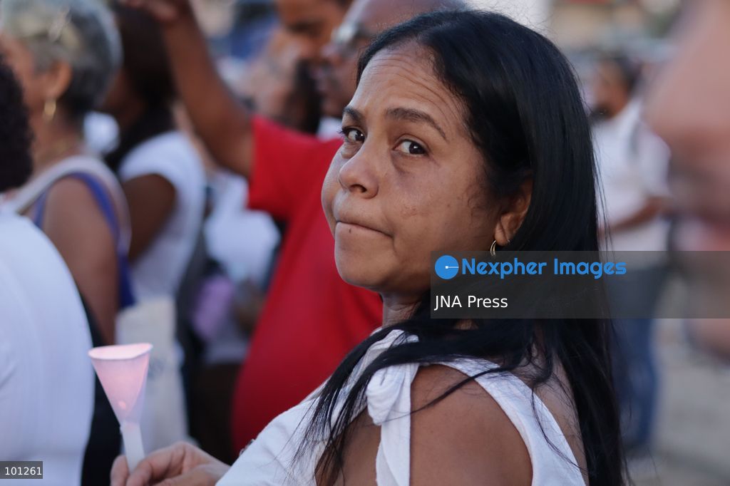 LA GUAIRA, VENEZUELA, OCTOBER 2, 2026: Families of victims, survivors and rescue workers gather during the "Haz de Luz" vigil in La Guaira to commemorate 100 days since the devastating earthquakes of June 24. Participants lit candles and joined prayers in memory of those killed and missing, while beams of light were projected into the sky near areas heavily damaged by the disaster. The commemorative event brought together residents, volunteers and emergency workers as recovery and search efforts continue in parts of La Guaira. Photo by Mario Flores/ JNA Press. (Photo by Mario Flores/JNA Press via Nexpher Images)