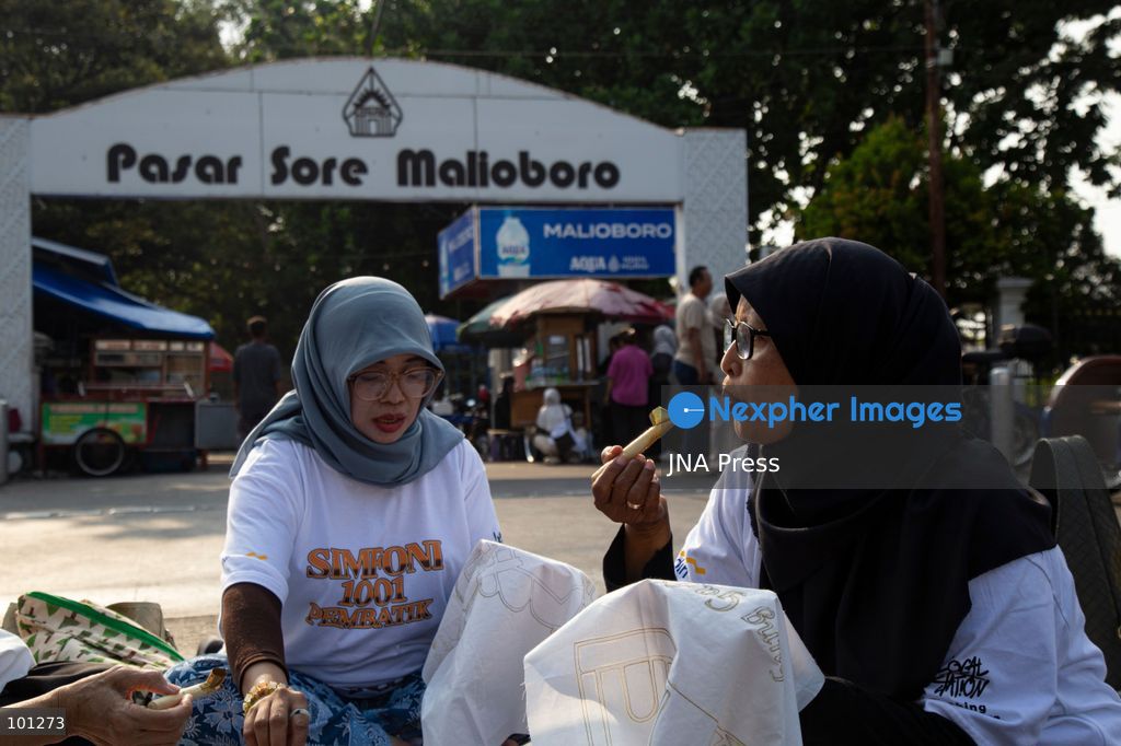 YOGYAKARTA, INDONESIA, OCTOBER 3, 2026: A total of 1,001 batik artists create traditional designs on fabric using canting tools along Malioboro Street in Yogyakarta during the "Symphony of 1001 Batik Artists" event. The mass batik-making activity was held as part of celebrations marking the 270th anniversary of Yogyakarta City and Indonesia's National Batik Day 2026. Photo by Topen Sapurta / JNA Press. (Photo by Topen Anggara Saputra/JNA Press via Nexpher Images)