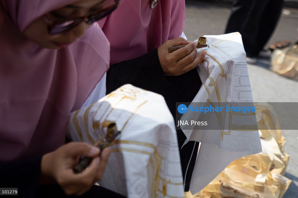 YOGYAKARTA, INDONESIA, OCTOBER 3, 2026: A total of 1,001 batik artists create traditional designs on fabric using canting tools along Malioboro Street in Yogyakarta during the "Symphony of 1001 Batik Artists" event. The mass batik-making activity was held as part of celebrations marking the 270th anniversary of Yogyakarta City and Indonesia's National Batik Day 2026. Photo by Topen Sapurta / JNA Press. (Photo by Topen Anggara Saputra/JNA Press via Nexpher Images)