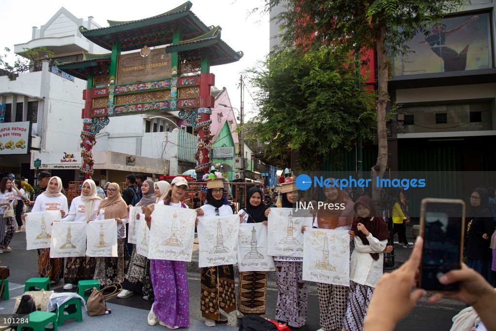 YOGYAKARTA, INDONESIA, OCTOBER 3, 2026: A total of 1,001 batik artists create traditional designs on fabric using canting tools along Malioboro Street in Yogyakarta during the "Symphony of 1001 Batik Artists" event. The mass batik-making activity was held as part of celebrations marking the 270th anniversary of Yogyakarta City and Indonesia's National Batik Day 2026. Photo by Topen Sapurta / JNA Press. (Photo by Topen Anggara Saputra/JNA Press via Nexpher Images)