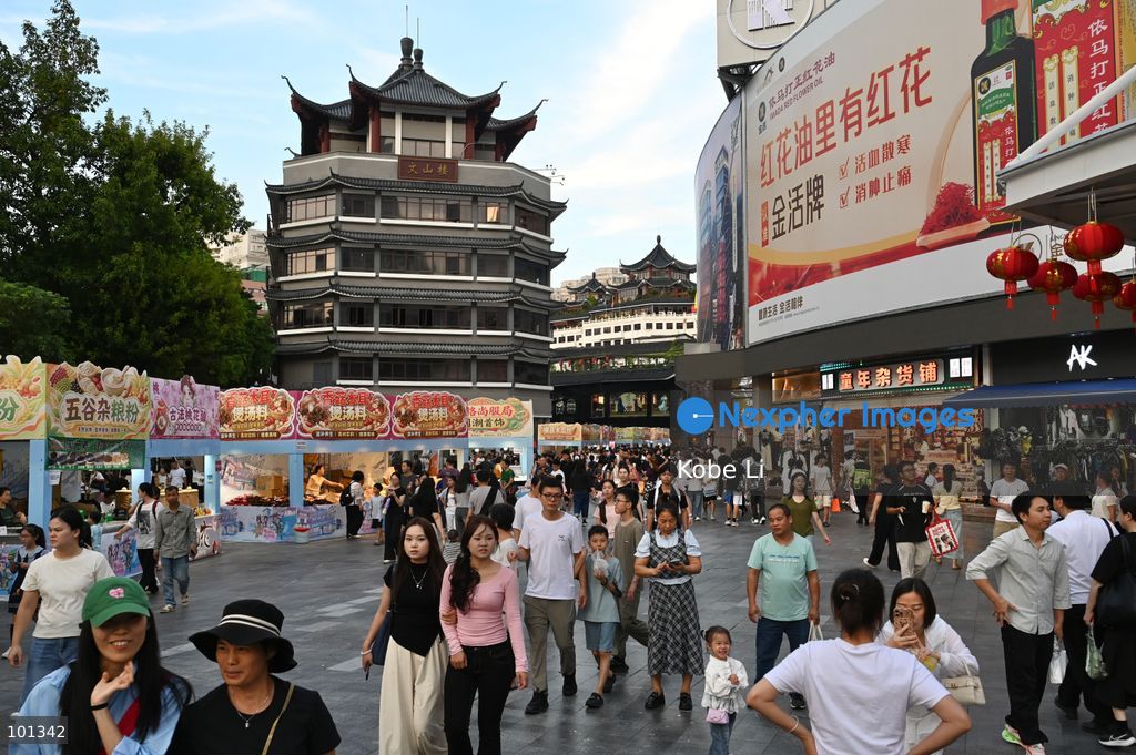 People shopping at Dongmen Pedestrian Street on October 3, 2026 in Shenzhen, China. (Photo by Kobe Li/Nexpher Images)