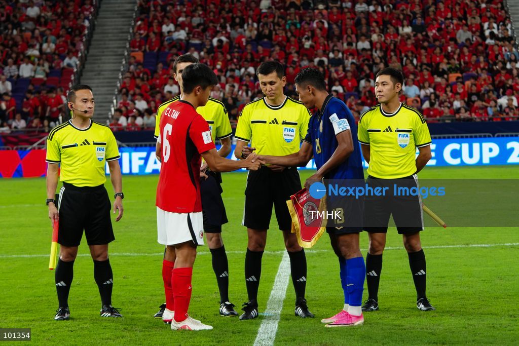 The captains of Hong Kong, China and Cambodia exchange pennants and take part in the pre-match coin toss with match officials ahead of the FIFA ASEAN Challenge Cup final at Kai Tak Stadium in Hong Kong on October 3, 2026. (Photo by Zulu Lo/TMHK via Nexpher Images)
