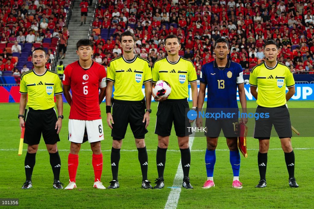 The captains of Hong Kong, China and Cambodia pose for photographs with match officials after exchanging pennants and taking part in the pre-match coin toss ahead of the FIFA ASEAN Challenge Cup final at Kai Tak Stadium in Hong Kong on October 3, 2026. (Photo by Zulu Lo/TMHK via Nexpher Images)