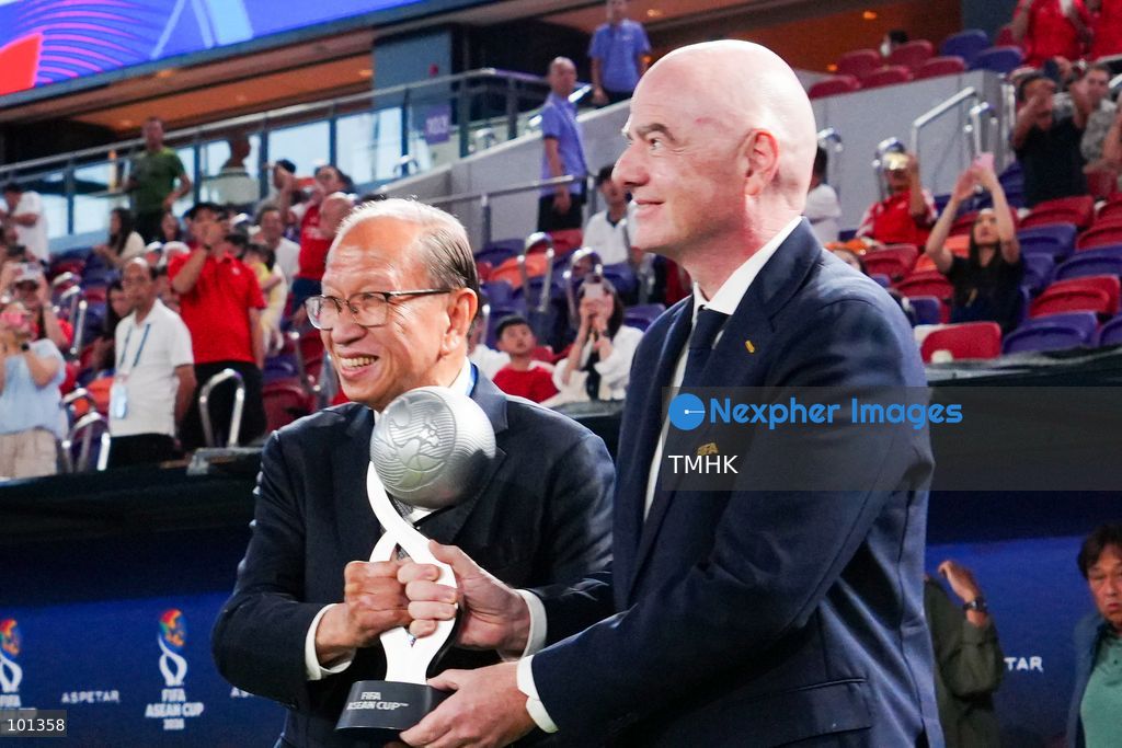 President of the Football Association of Hong Kong, China Pui Kwan-kay and FIFA President Gianni Infantino carry the trophy onto the pitch ahead of the FIFA ASEAN Challenge Cup final between Hong Kong, China and Cambodia at Kai Tak Stadium in Hong Kong on October 3, 2026. (Photo by Zulu Lo/TMHK via Nexpher Images)