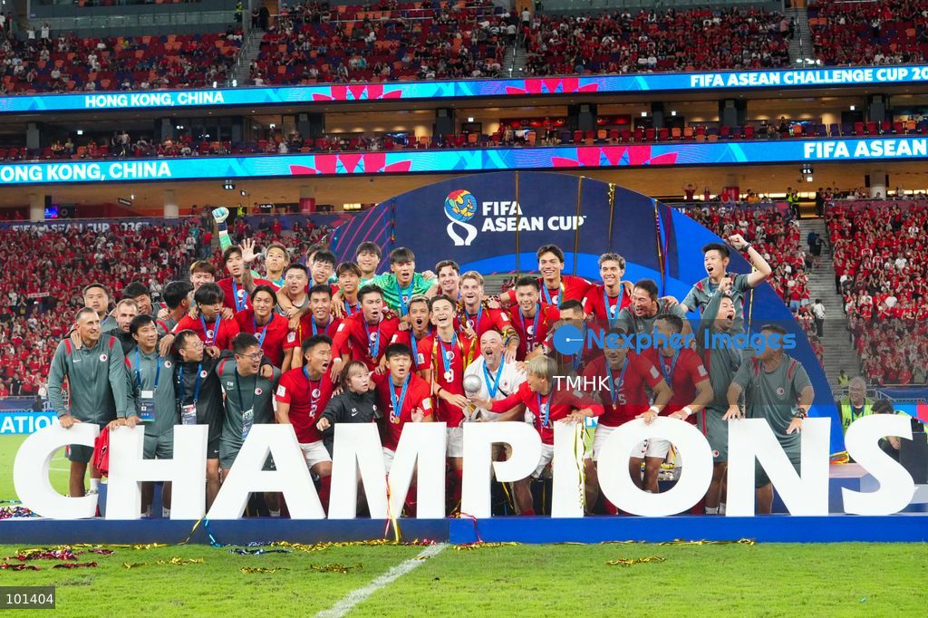 Players and coaching staff of Hong Kong, China lift the trophy after winning the FIFA ASEAN Challenge Cup final against Cambodia at Kai Tak Stadium in Hong Kong on October 3, 2026. (Photo by Zulu Lo/TMHK via Nexpher Images)