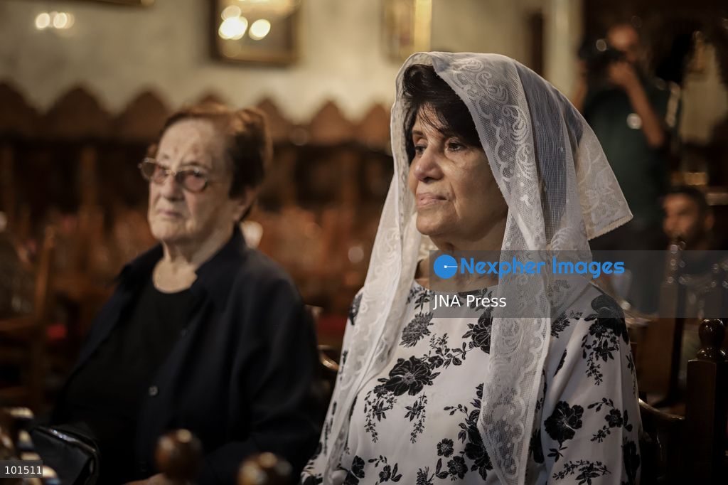 GAZA, PALESTINE – OCTOBER 3, 2026: Mourners attended the funeral of Christian mother Maysa Abu Dawood and her daughter Mary at Saint Porphyrius Church in Gaza City on Saturday, after they were killed early in the morning when an Israeli airstrike hit their residential apartment in the city. Mukhtars, community reconciliation figures and members of the Palestinian Civil Defense attended the funeral. The funeral was held at Saint Porphyrius Church, where mourners gathered to pay their respects to the mother and daughter. Photo by Mohammed M. Skaik / JNA Press. (Photo by Mohammed M Skaik/JNA Press via Nexpher Images)