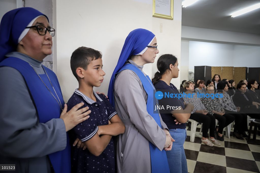 GAZA, PALESTINE – OCTOBER 3, 2026: Mourners attended the funeral of Christian mother Maysa Abu Dawood and her daughter Mary at Saint Porphyrius Church in Gaza City on Saturday, after they were killed early in the morning when an Israeli airstrike hit their residential apartment in the city. Mukhtars, community reconciliation figures and members of the Palestinian Civil Defense attended the funeral. The funeral was held at Saint Porphyrius Church, where mourners gathered to pay their respects to the mother and daughter. Photo by Mohammed M. Skaik / JNA Press. (Photo by Mohammed M Skaik/JNA Press via Nexpher Images)