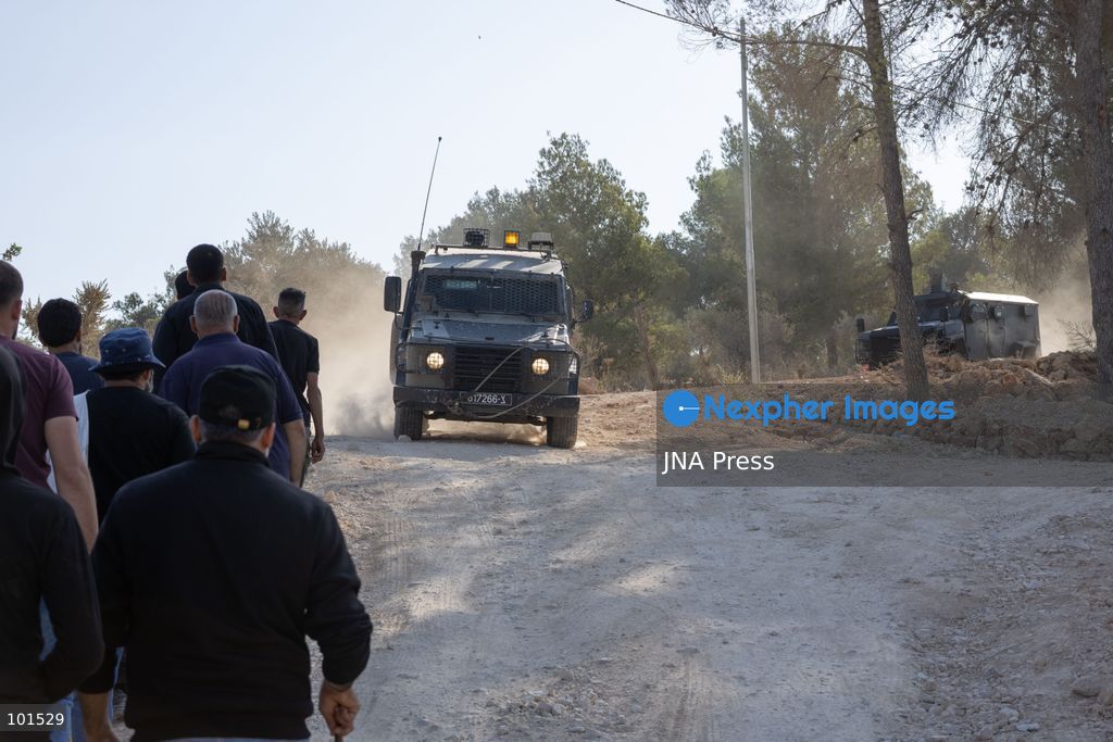 JABAL KAMAS, BEITA, PALESTINE – OCTOBER 3, 2026: Israeli forces arrested seven Palestinian residents who were attempting to harvest their land in Jabal Kamas, near Beita. According to the provided information, nearly 20 Israeli settlers from the “Mevaser Hashalom” outpost, also known as “Herald of Peace,” attacked the farmers as they began working, while Israeli soldiers opened live fire. The military later arrested seven Palestinian residents and declared the area a “closed military zone.” The incident occurred as Palestinian farmers attempted to access and harvest their agricultural land near Beita. Photo by Roman Levin / JNA Press. (Photo by Roman Levin/JNA Press via Nexpher Images)