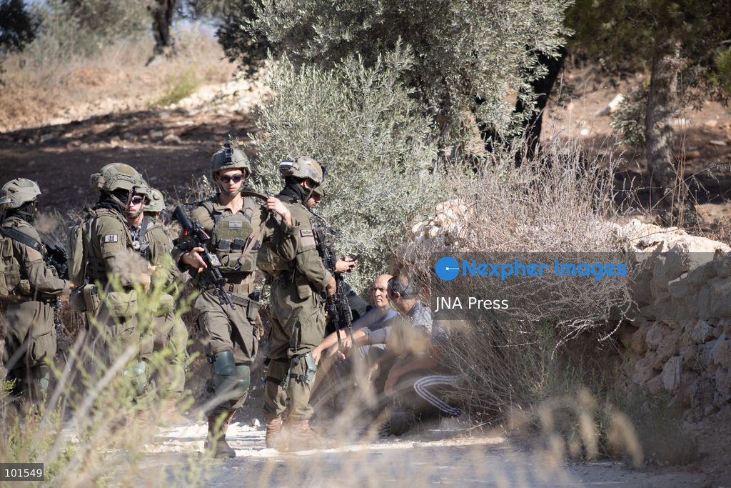 JABAL KAMAS, BEITA, PALESTINE – OCTOBER 3, 2026: Israeli forces arrested seven Palestinian residents who were attempting to harvest their land in Jabal Kamas, near Beita. According to the provided information, nearly 20 Israeli settlers from the “Mevaser Hashalom” outpost, also known as “Herald of Peace,” attacked the farmers as they began working, while Israeli soldiers opened live fire. The military later arrested seven Palestinian residents and declared the area a “closed military zone.” The incident occurred as Palestinian farmers attempted to access and harvest their agricultural land near Beita. Photo by Roman Levin / JNA Press. (Photo by Roman Levin/JNA Press via Nexpher Images)