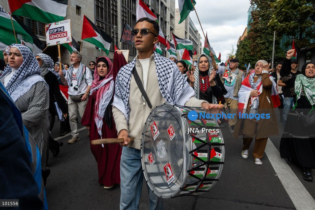 BERLIN, GERMANY – OCTOBER 3, 2026: Thousands of people took part in a peace demonstration in central Berlin on German Unity Day. A coalition of peace initiatives, trade unions, and political and civil-society groups organized the protest. The demonstrators focused on military rearmament, the possible reintroduction of conscription, and Germany’s military policy. The march began at the Brandenburg Gate and continued through the government district before concluding with a rally. The demonstration brought together participants expressing opposition to Germany’s current and proposed military policies on a national public holiday. Photo by Jess Flom / JNA Press. (Photo by jess flom/JNA Press via Nexpher Images)