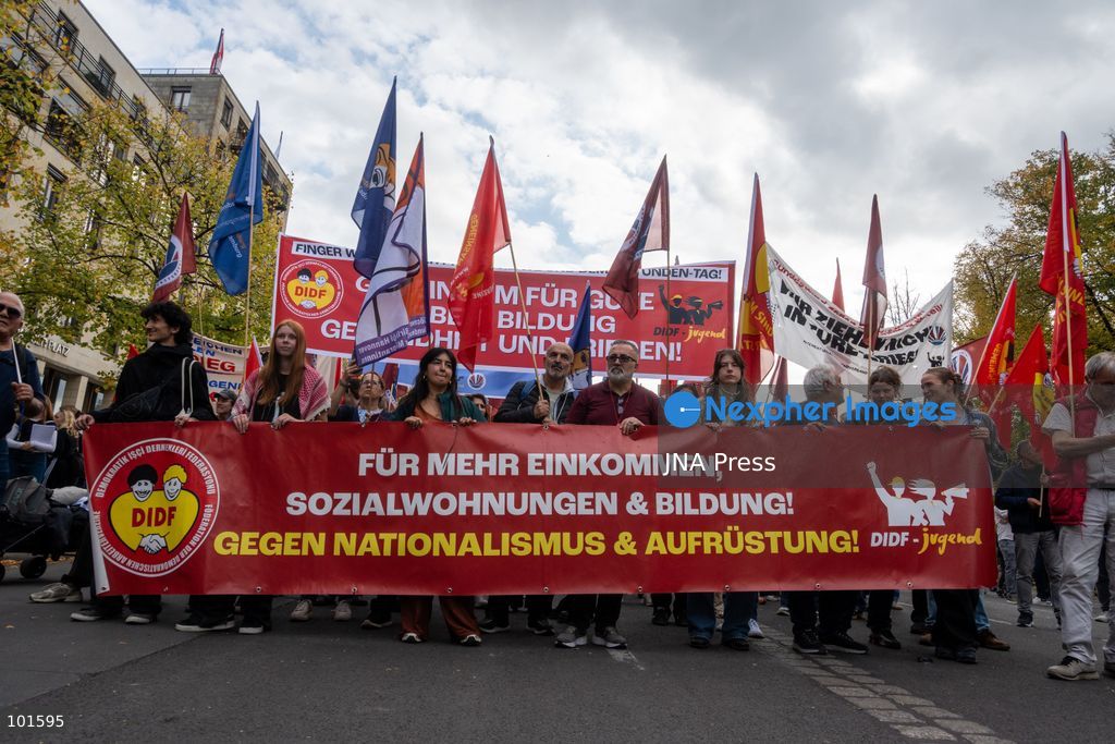 BERLIN, GERMANY – OCTOBER 3, 2026: Thousands of people took part in a peace demonstration in central Berlin on German Unity Day. A coalition of peace initiatives, trade unions, and political and civil-society groups organized the protest. The demonstrators focused on military rearmament, the possible reintroduction of conscription, and Germany’s military policy. The march began at the Brandenburg Gate and continued through the government district before concluding with a rally. The demonstration brought together participants expressing opposition to Germany’s current and proposed military policies on a national public holiday. Photo by Jess Flom / JNA Press. (Photo by jess flom/JNA Press via Nexpher Images)