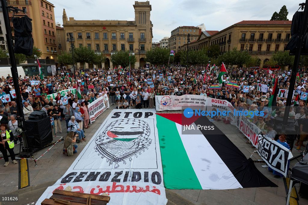 PAMPLONA, SPAIN, OCTOBER 3, 2026: Demonstrators take part in a pro-Palestinian march called by the citizens' platform Yala Nafarroa in Pamplona. Protesters carried Palestinian flags and banners expressing solidarity with Gaza, including a large banner reading "Stop Genocide," while participants also displayed messages calling for the protection of journalists. Photo by Unai Beroiz / JNA Press. (Photo by Unai Beroiz/JNA Press via Nexpher Images)