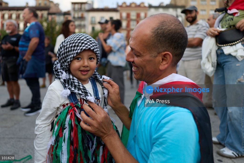 PAMPLONA, SPAIN, OCTOBER 3, 2026: Demonstrators take part in a pro-Palestinian march called by the citizens' platform Yala Nafarroa in Pamplona. Protesters carried Palestinian flags and banners expressing solidarity with Gaza, including a large banner reading "Stop Genocide," while participants also displayed messages calling for the protection of journalists. Photo by Unai Beroiz / JNA Press. (Photo by Unai Beroiz/JNA Press via Nexpher Images)