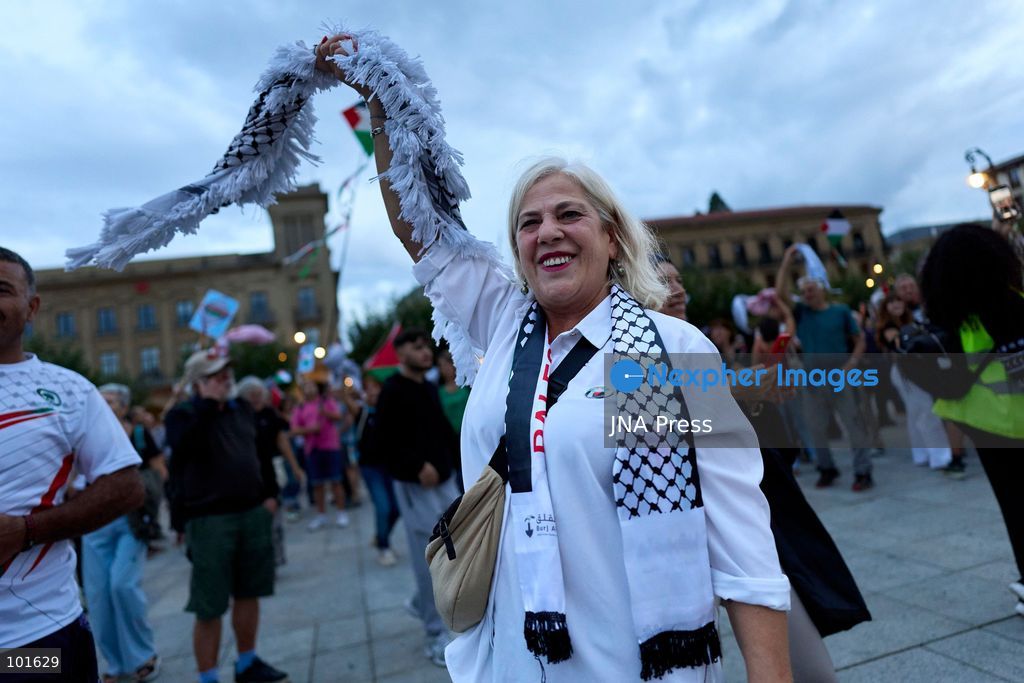 PAMPLONA, SPAIN, OCTOBER 3, 2026: Demonstrators take part in a pro-Palestinian march called by the citizens' platform Yala Nafarroa in Pamplona. Protesters carried Palestinian flags and banners expressing solidarity with Gaza, including a large banner reading "Stop Genocide," while participants also displayed messages calling for the protection of journalists. Photo by Unai Beroiz / JNA Press. (Photo by Unai Beroiz/JNA Press via Nexpher Images)