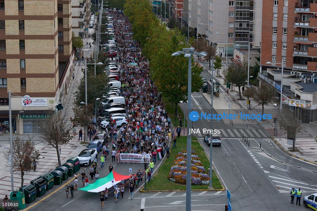PAMPLONA, SPAIN, OCTOBER 3, 2026: Demonstrators take part in a pro-Palestinian march called by the citizens' platform Yala Nafarroa in Pamplona. Protesters carried Palestinian flags and banners expressing solidarity with Gaza, including a large banner reading "Stop Genocide," while participants also displayed messages calling for the protection of journalists. Photo by Unai Beroiz / JNA Press. (Photo by Unai Beroiz/JNA Press via Nexpher Images)