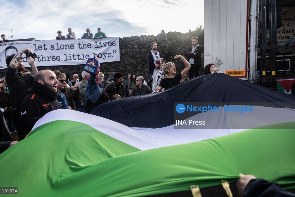 PORTADOWN, NORTHERN IRELAND, OCTOBER 3, 2026: Thousands of people gather near Garvaghy Road in Portadown during a solidarity rally on the seventh day of protests against an Orange Order parade through the area. Participants travelled from across Ireland to support the local community amid the continuing dispute over the proposed parade route. Organizers estimated that around 10,000 people attended the rally. Photo by Nadia Caimi / JNA Press. (Photo by Nadia Caimi/JNA Press via Nexpher Images)
