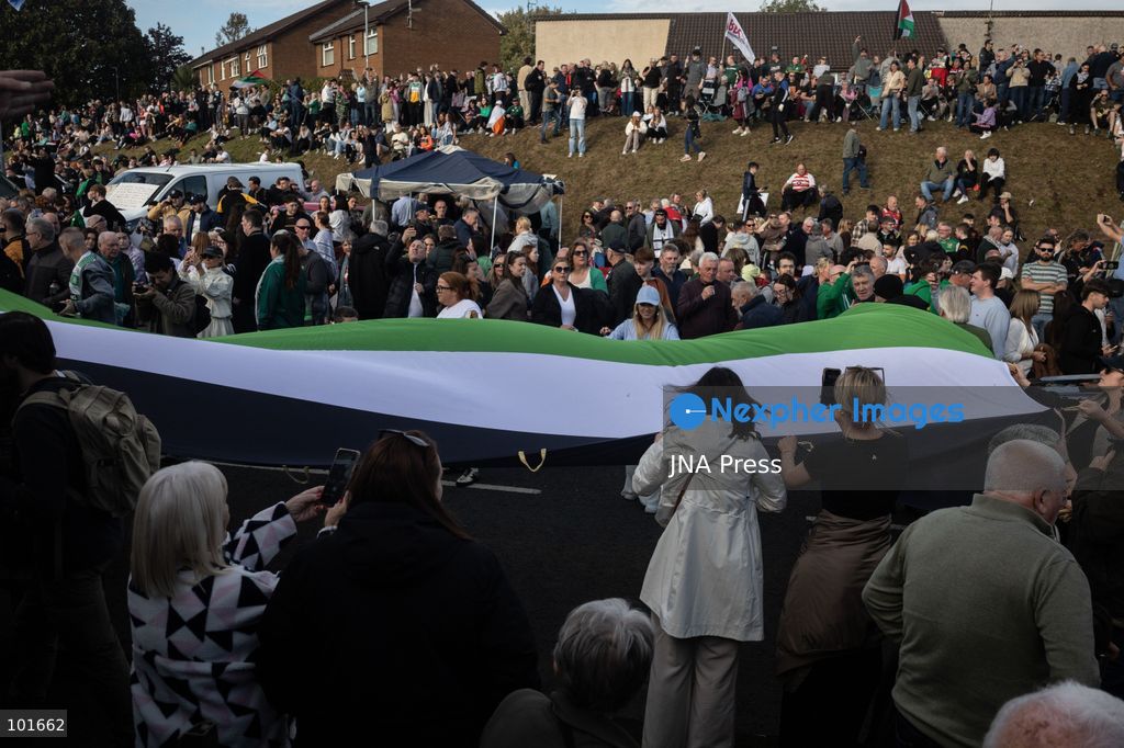 PORTADOWN, NORTHERN IRELAND, OCTOBER 3, 2026: Thousands of people gather near Garvaghy Road in Portadown during a solidarity rally on the seventh day of protests against an Orange Order parade through the area. Participants travelled from across Ireland to support the local community amid the continuing dispute over the proposed parade route. Organizers estimated that around 10,000 people attended the rally. Photo by Nadia Caimi / JNA Press. (Photo by Nadia Caimi/JNA Press via Nexpher Images)