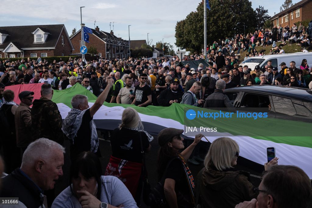 PORTADOWN, NORTHERN IRELAND, OCTOBER 3, 2026: Thousands of people gather near Garvaghy Road in Portadown during a solidarity rally on the seventh day of protests against an Orange Order parade through the area. Participants travelled from across Ireland to support the local community amid the continuing dispute over the proposed parade route. Organizers estimated that around 10,000 people attended the rally. Photo by Nadia Caimi / JNA Press. (Photo by Nadia Caimi/JNA Press via Nexpher Images)