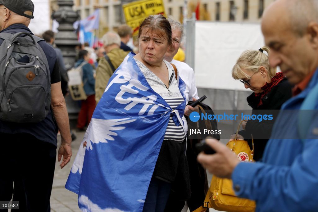 BERLIN, GERMANY, OCTOBER 3, 2026: Thousands of people march through central Berlin during a peace demonstration against military rearmament, compulsory military service and war on German Unity Day. Protesters gathered near the Brandenburg Gate before marching through the city, with trade unions, peace movements, political groups and a pro-Palestinian bloc taking part. Berlin police estimated attendance at around 5,800, while organizers put the number at more than 20,000. Police detained at least two protesters during the demonstration. Photo by Alessia Cocca / JNA Press (Photo by Alessia Cocca/JNA Press via Nexpher Images)