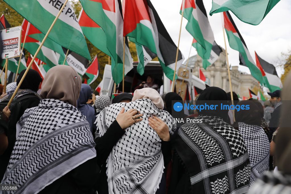 BERLIN, GERMANY, OCTOBER 3, 2026: Thousands of people march through central Berlin during a peace demonstration against military rearmament, compulsory military service and war on German Unity Day. Protesters gathered near the Brandenburg Gate before marching through the city, with trade unions, peace movements, political groups and a pro-Palestinian bloc taking part. Berlin police estimated attendance at around 5,800, while organizers put the number at more than 20,000. Police detained at least two protesters during the demonstration. Photo by Alessia Cocca / JNA Press (Photo by Alessia Cocca/JNA Press via Nexpher Images)