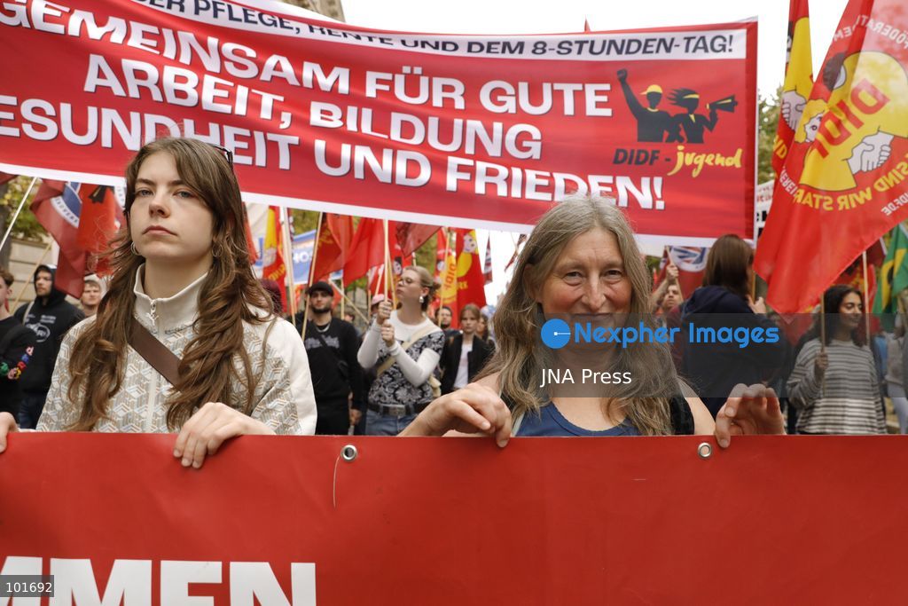 BERLIN, GERMANY, OCTOBER 3, 2026: Thousands of people march through central Berlin during a peace demonstration against military rearmament, compulsory military service and war on German Unity Day. Protesters gathered near the Brandenburg Gate before marching through the city, with trade unions, peace movements, political groups and a pro-Palestinian bloc taking part. Berlin police estimated attendance at around 5,800, while organizers put the number at more than 20,000. Police detained at least two protesters during the demonstration. Photo by Alessia Cocca / JNA Press (Photo by Alessia Cocca/JNA Press via Nexpher Images)