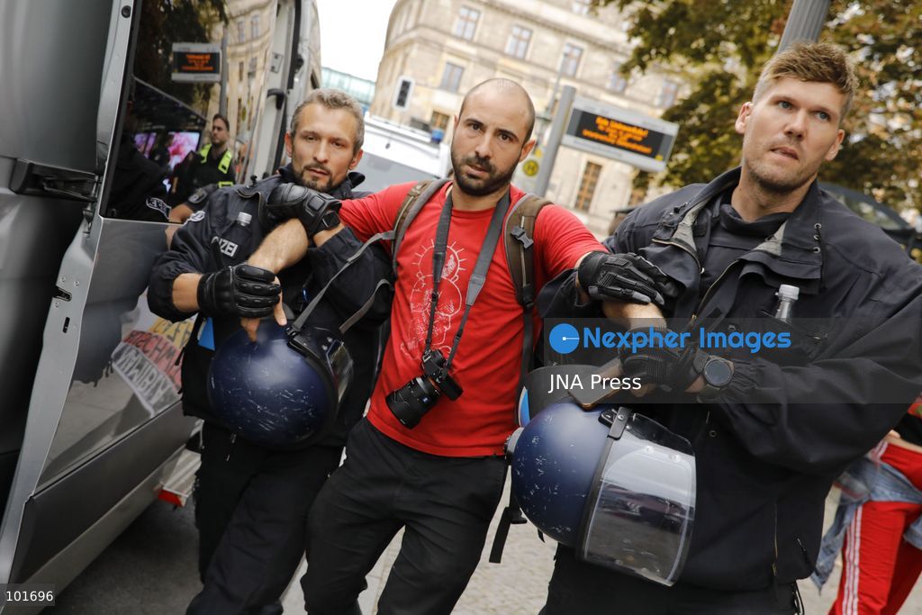 BERLIN, GERMANY, OCTOBER 3, 2026: Thousands of people march through central Berlin during a peace demonstration against military rearmament, compulsory military service and war on German Unity Day. Protesters gathered near the Brandenburg Gate before marching through the city, with trade unions, peace movements, political groups and a pro-Palestinian bloc taking part. Berlin police estimated attendance at around 5,800, while organizers put the number at more than 20,000. Police detained at least two protesters during the demonstration. Photo by Alessia Cocca / JNA Press (Photo by Alessia Cocca/JNA Press via Nexpher Images)