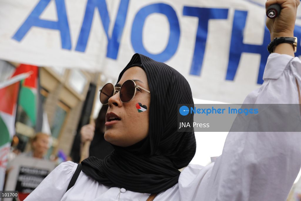 BERLIN, GERMANY, OCTOBER 3, 2026: Thousands of people march through central Berlin during a peace demonstration against military rearmament, compulsory military service and war on German Unity Day. Protesters gathered near the Brandenburg Gate before marching through the city, with trade unions, peace movements, political groups and a pro-Palestinian bloc taking part. Berlin police estimated attendance at around 5,800, while organizers put the number at more than 20,000. Police detained at least two protesters during the demonstration. Photo by Alessia Cocca / JNA Press (Photo by Alessia Cocca/JNA Press via Nexpher Images)